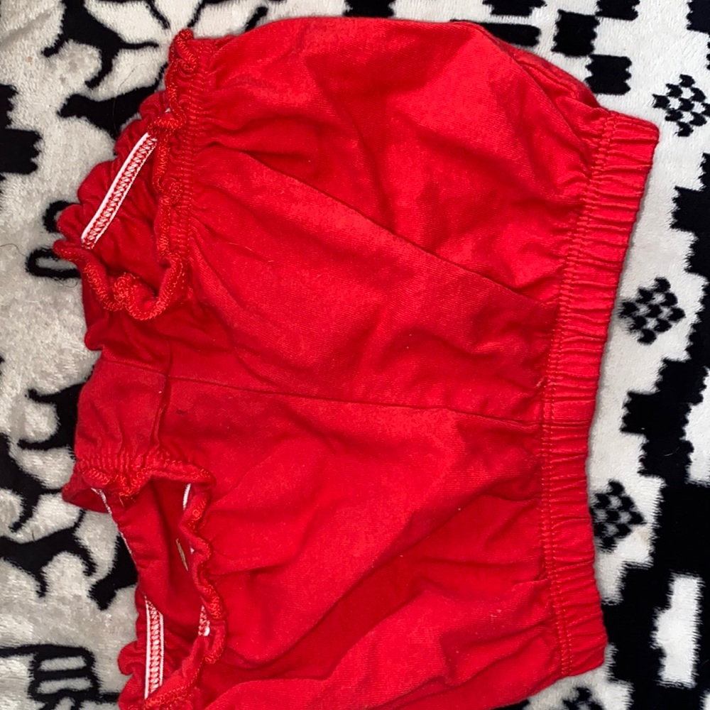 red shorts